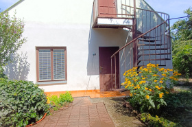 Family house in the city center and multifunctional building in Komárno