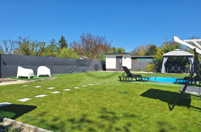 A carefully maintained sunny garden in Komárno